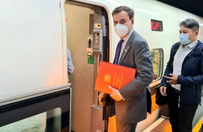 Greg boarding a high speed train in Taiwan