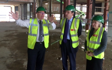 Greg Hands MP being shown around the building works at the National Army Museum